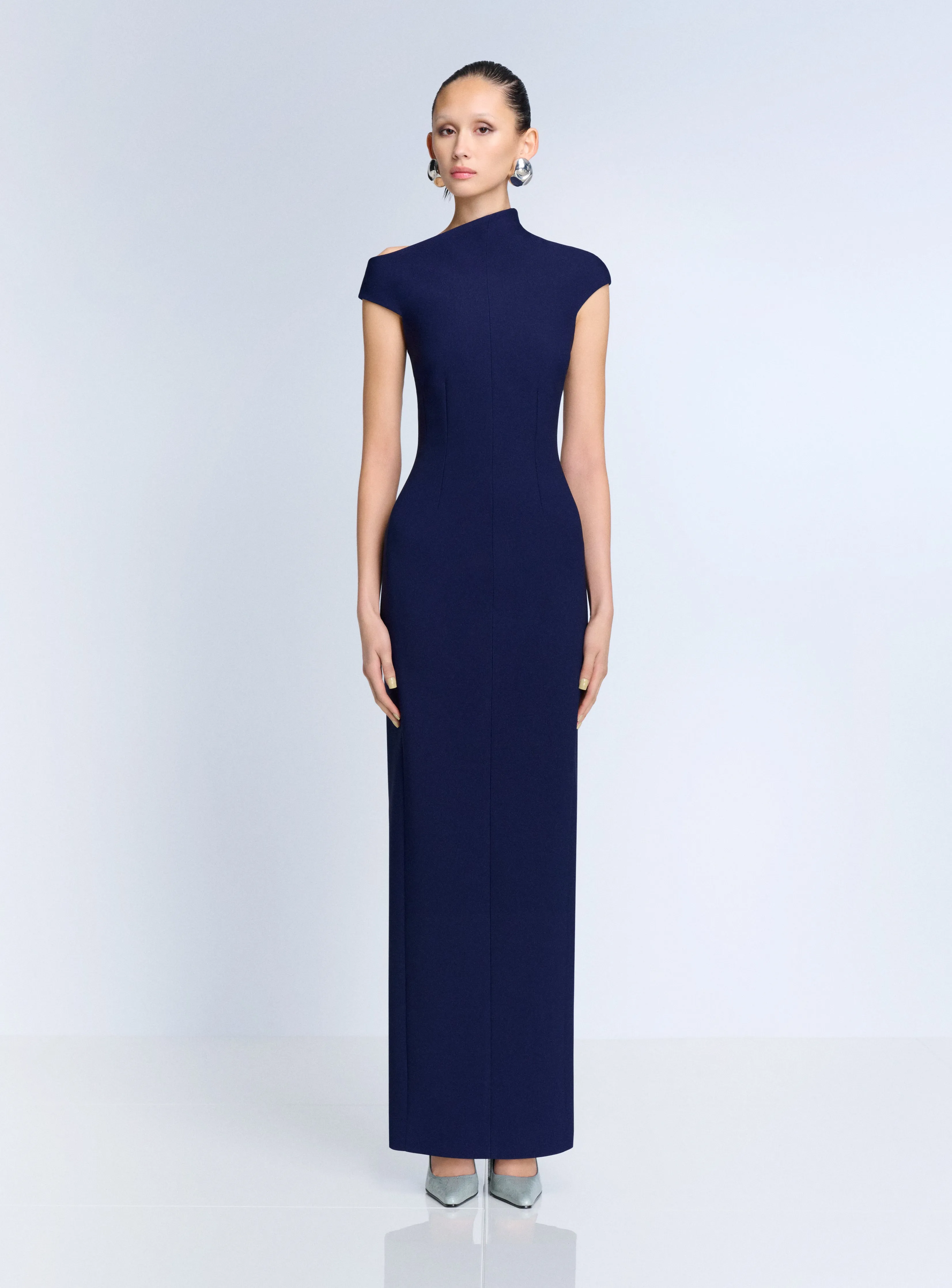 The Arion Maxi Dress in Navy sold by Solace London