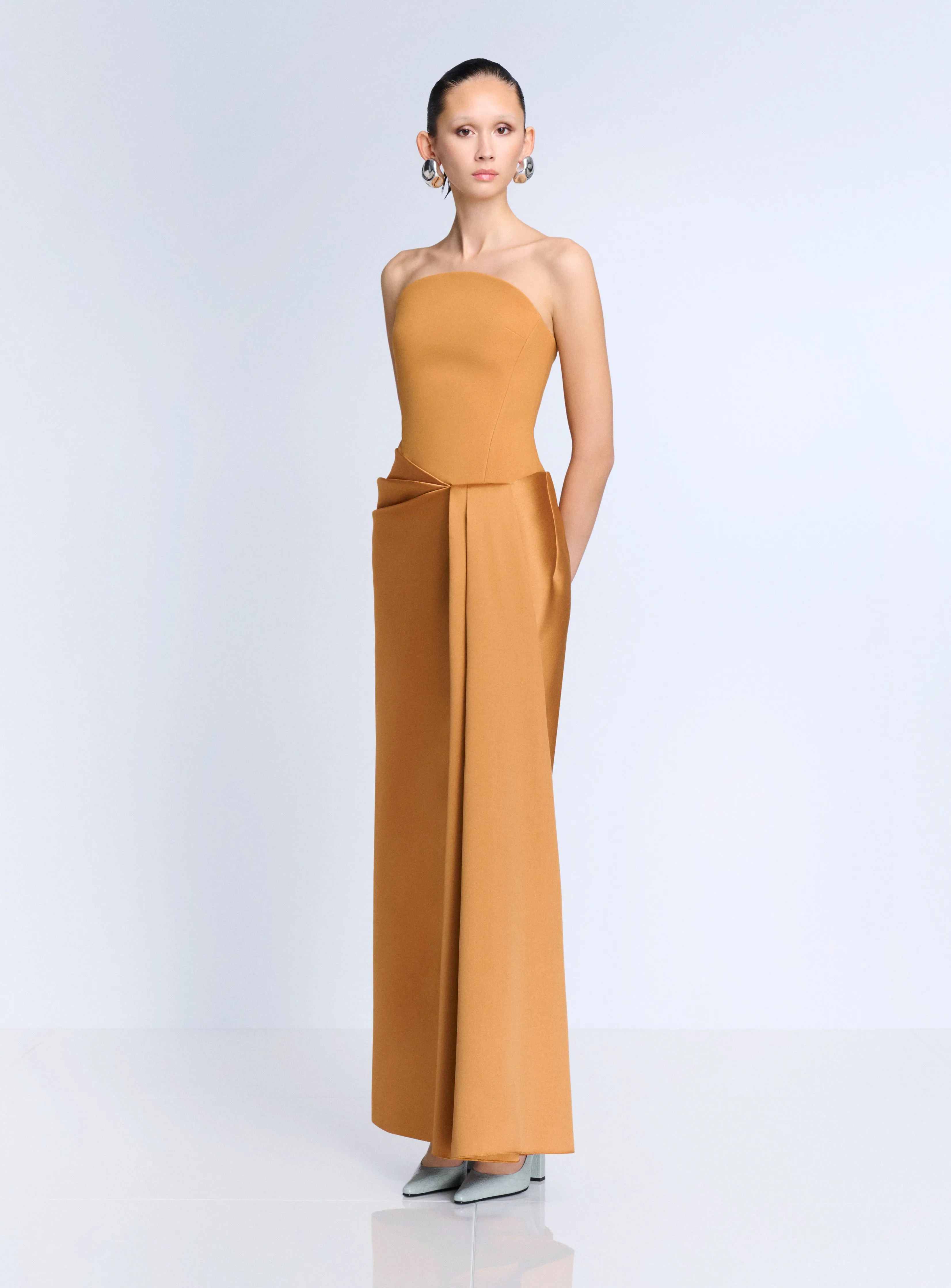 The Seri Maxi Dress in Clay sold by Solace London