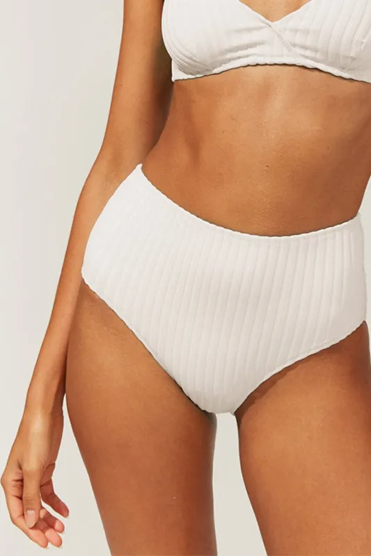 The Beverly Ribbed Bikini Bottom Marshmallow sold by SOLID & STRIPED