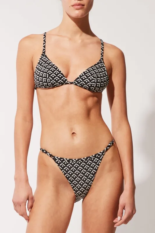 The Lulu Bikini Top sold by SOLID & STRIPED