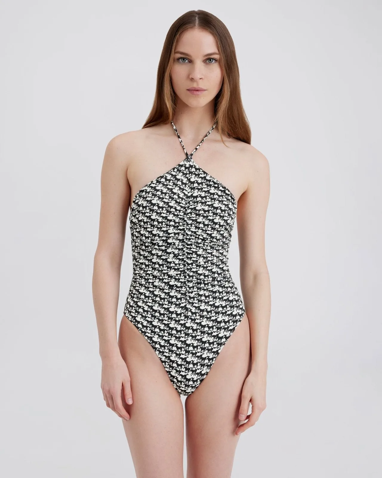 Mina One Piece Horse Print Noir sold by SOLID & STRIPED