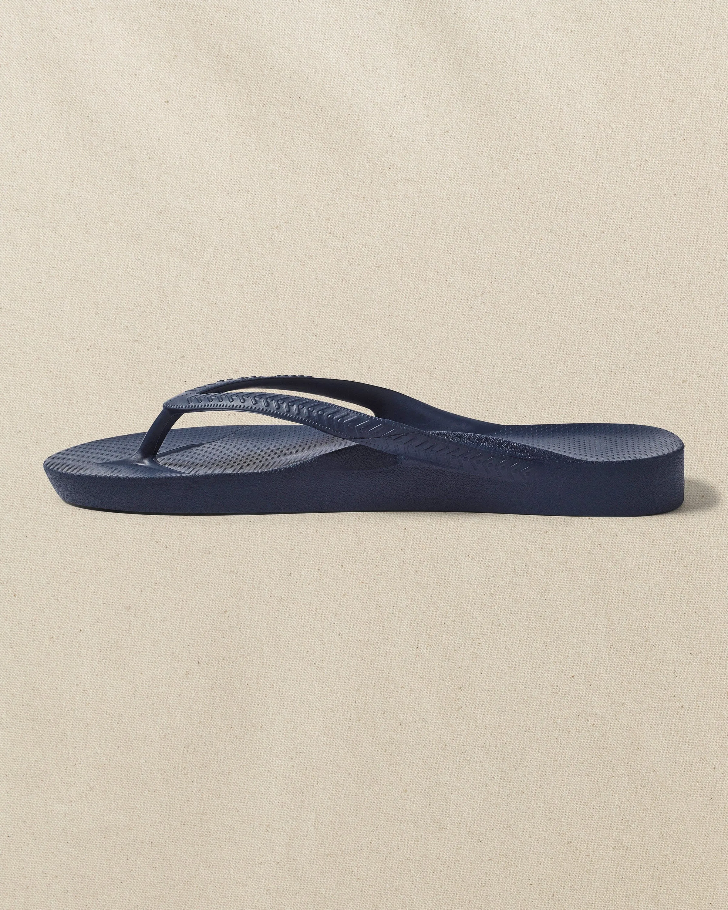 Archies Navy Arch Support Flip Flop sold by Southern Tide