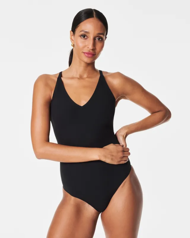 Suit Yourself V-Neck Ribbed Bodysuit sold by SPANX