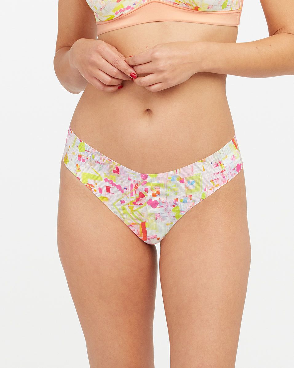 Under Statements® Illuminate-Her™ Thong sold by SPANX