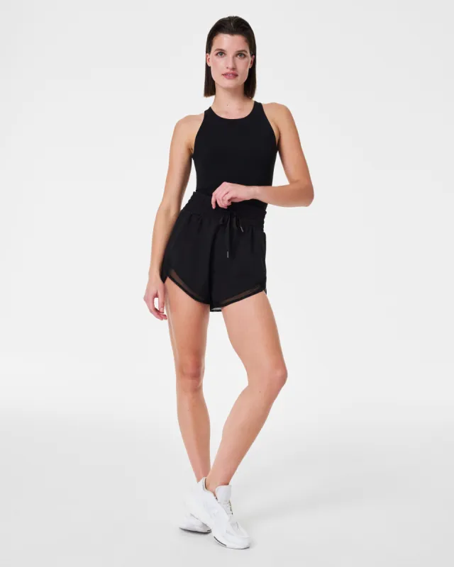 The Get Moving Easy Access Exercise Romper sold by SPANX