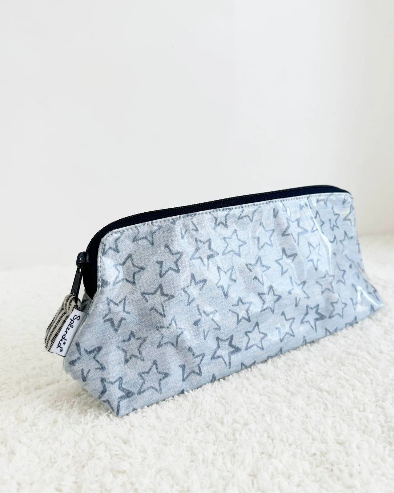 Small Outline Stars Makeup Bag sold by Splendid