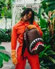 SHARKS AND SKULLS BACKPACK (DLXV) sold by Sprayground