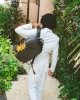 A.i.3 SHARK BITE BLACK GOLD BACKPACK (DLXV) sold by Sprayground