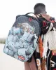 BANK STACKS OF ZAMUNDA COMING 2 AMERICA BACKPACK sold by Sprayground
