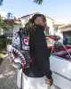 SHARKS IN PARIS NIGHTFALL BACKPACK (DLXV) sold by Sprayground