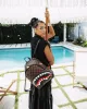 SAWTOOTH SHARKS IN PARIS SAVAGE BACKPACK sold by Sprayground