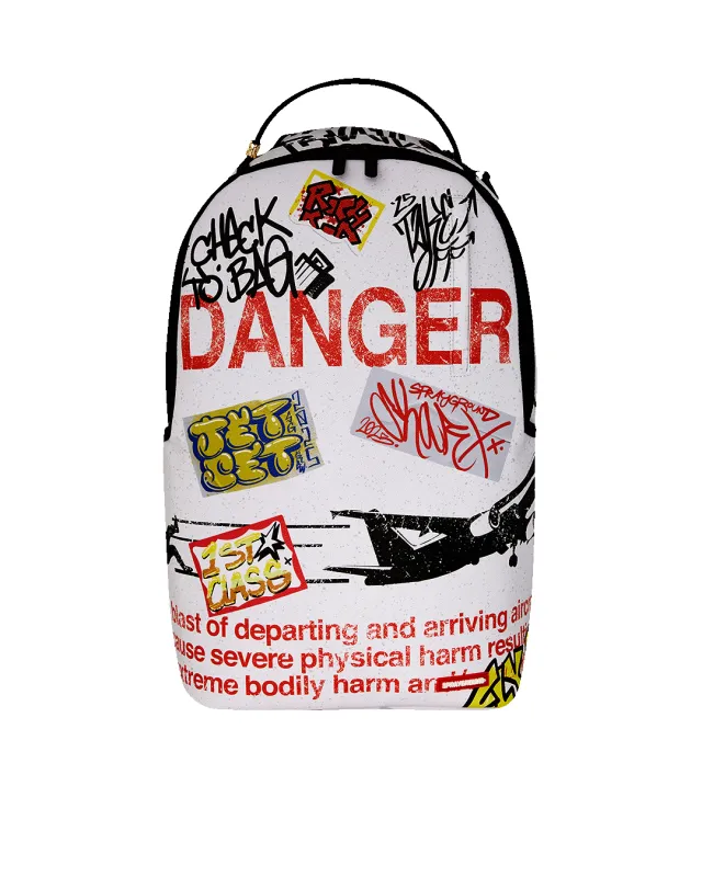 JETBLAST SIGN ON THE RUNWAY BACKPACK sold by Sprayground