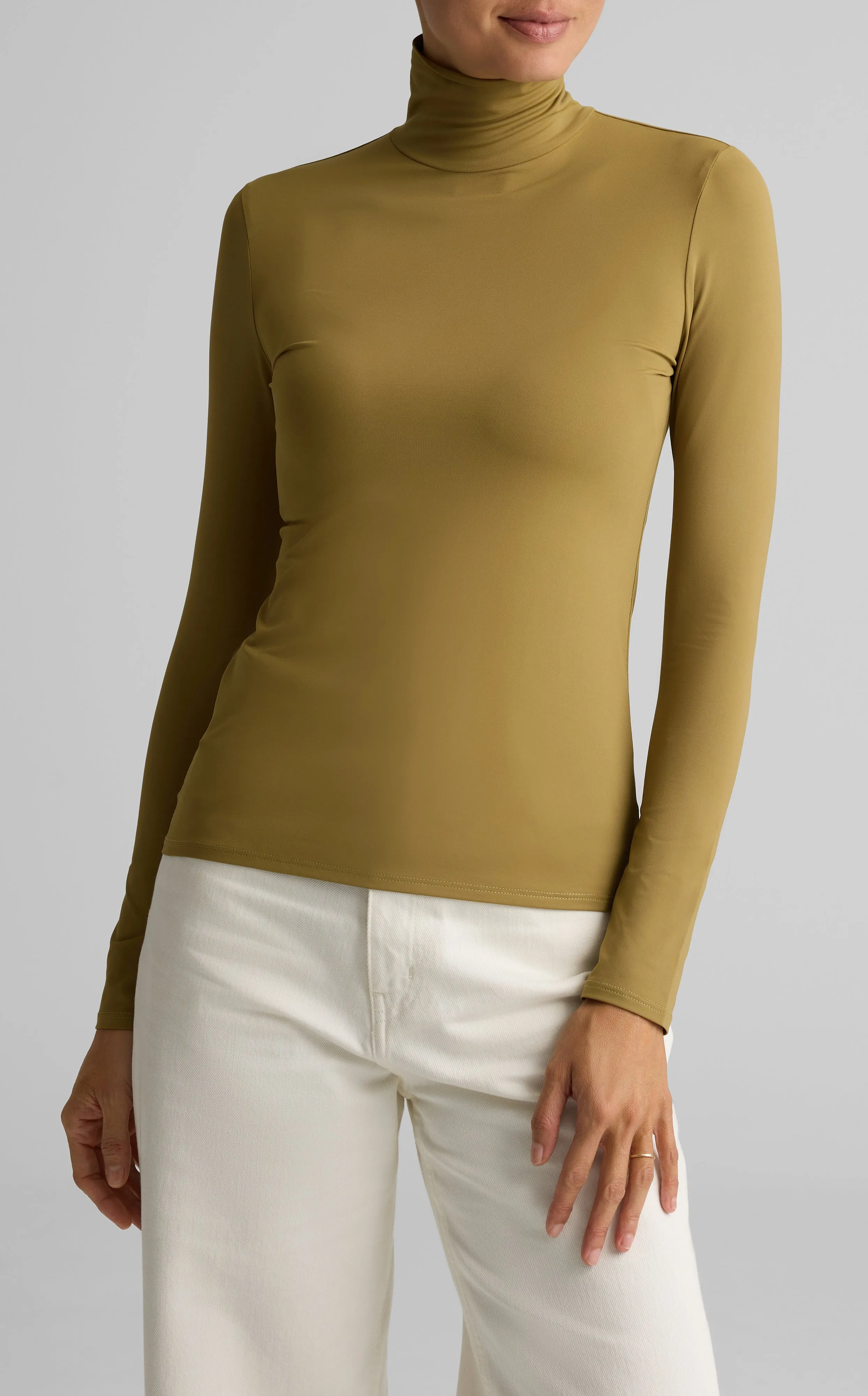 Nuda Turtleneck Top sold by St. John