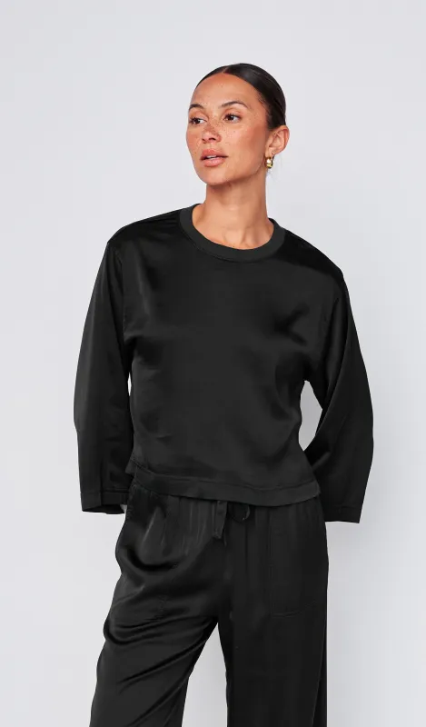 Cosmo Satin Crewneck Top in Black made by Stateside