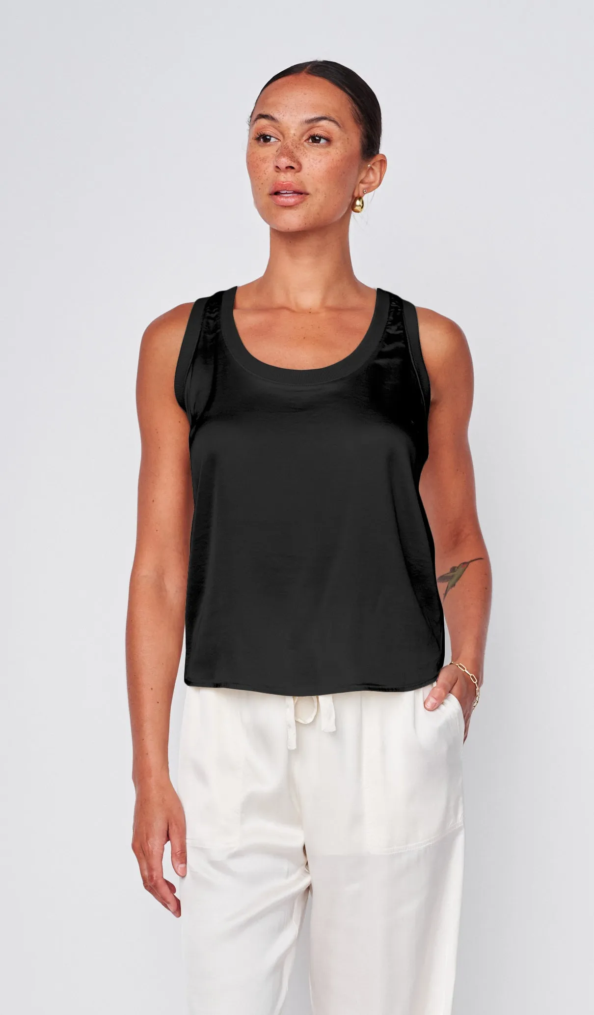 Cosmo Satin Sleeveless Top in Black sold by Stateside