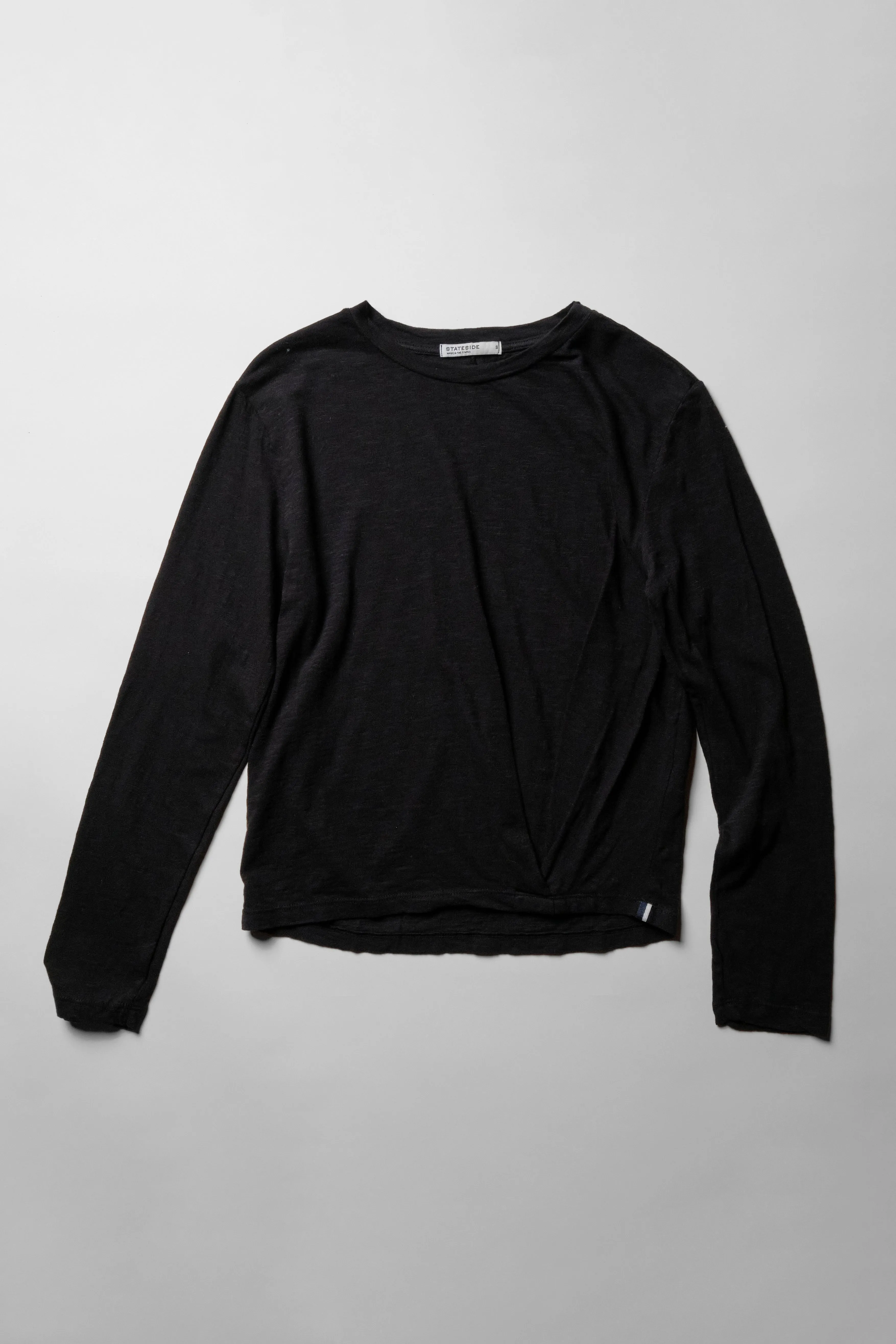 Supima Slub Jersey Long Sleeve Twist Tee in Black sold by Stateside