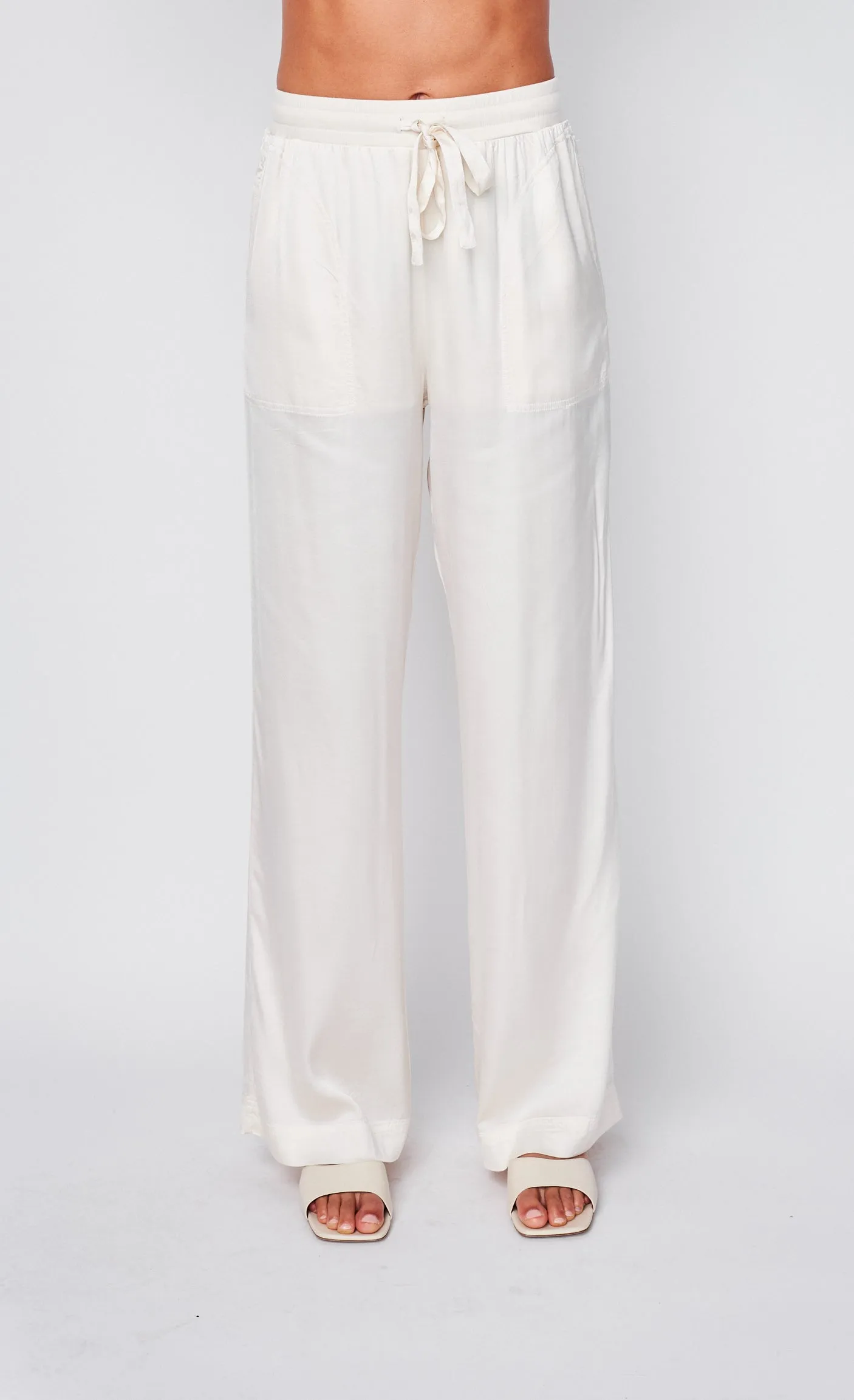 Cosmo Satin Drawstring Pant in Cream sold by Stateside