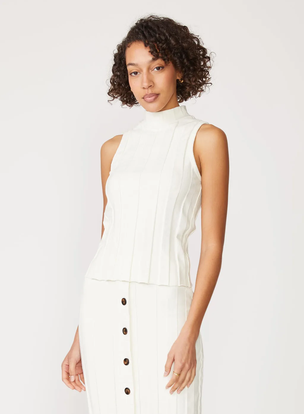Box Pleat Mock Neck Top in Cream sold by Stateside