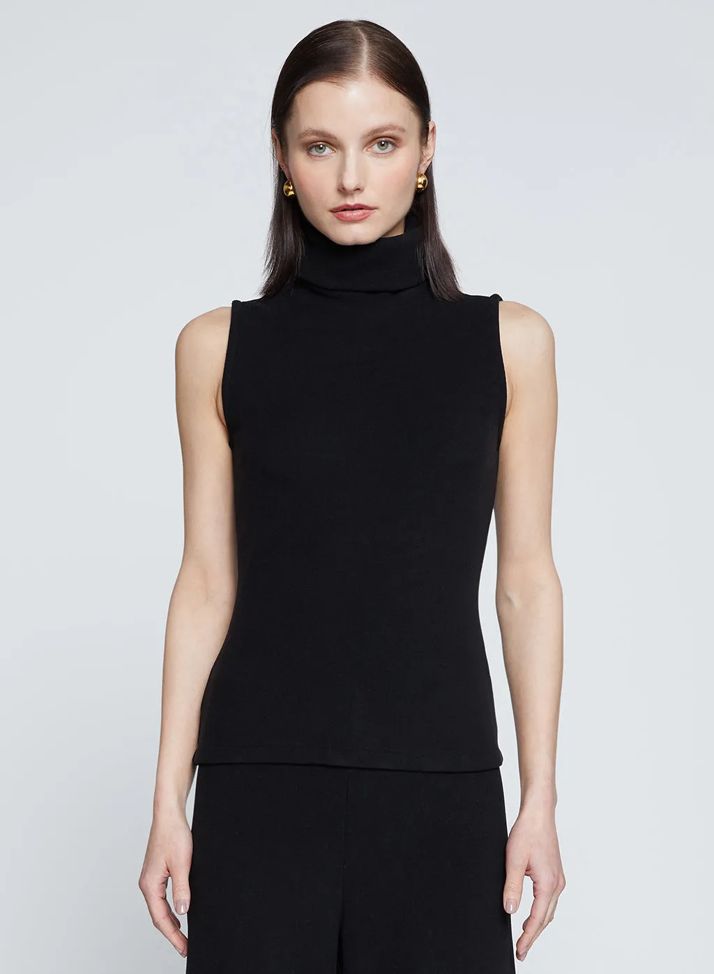 Honeyluxe Flat Back Rib Sleeveless Turtleneck in Black sold by Stateside