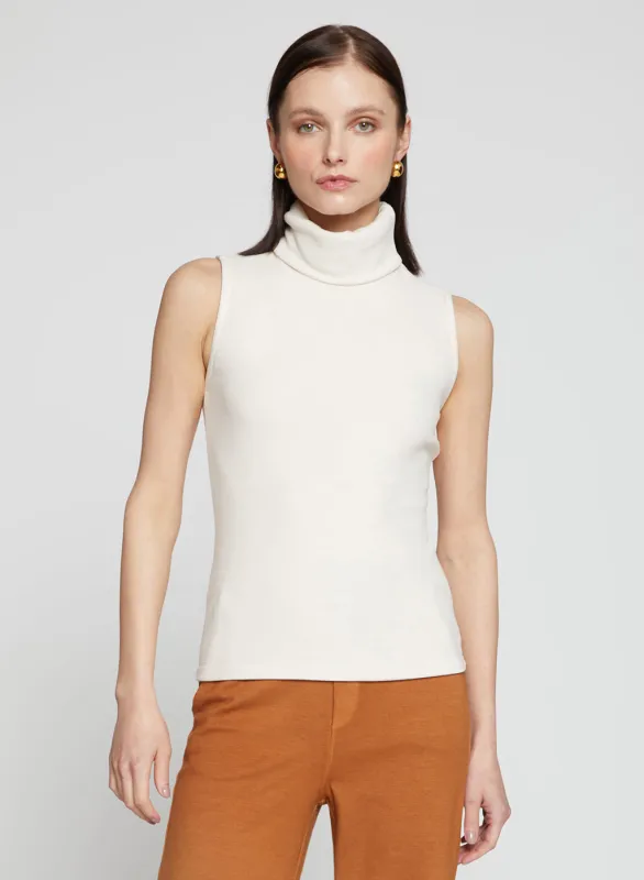 Honeyluxe Flat Back Rib Sleeveless Turtleneck in Cream made by Stateside