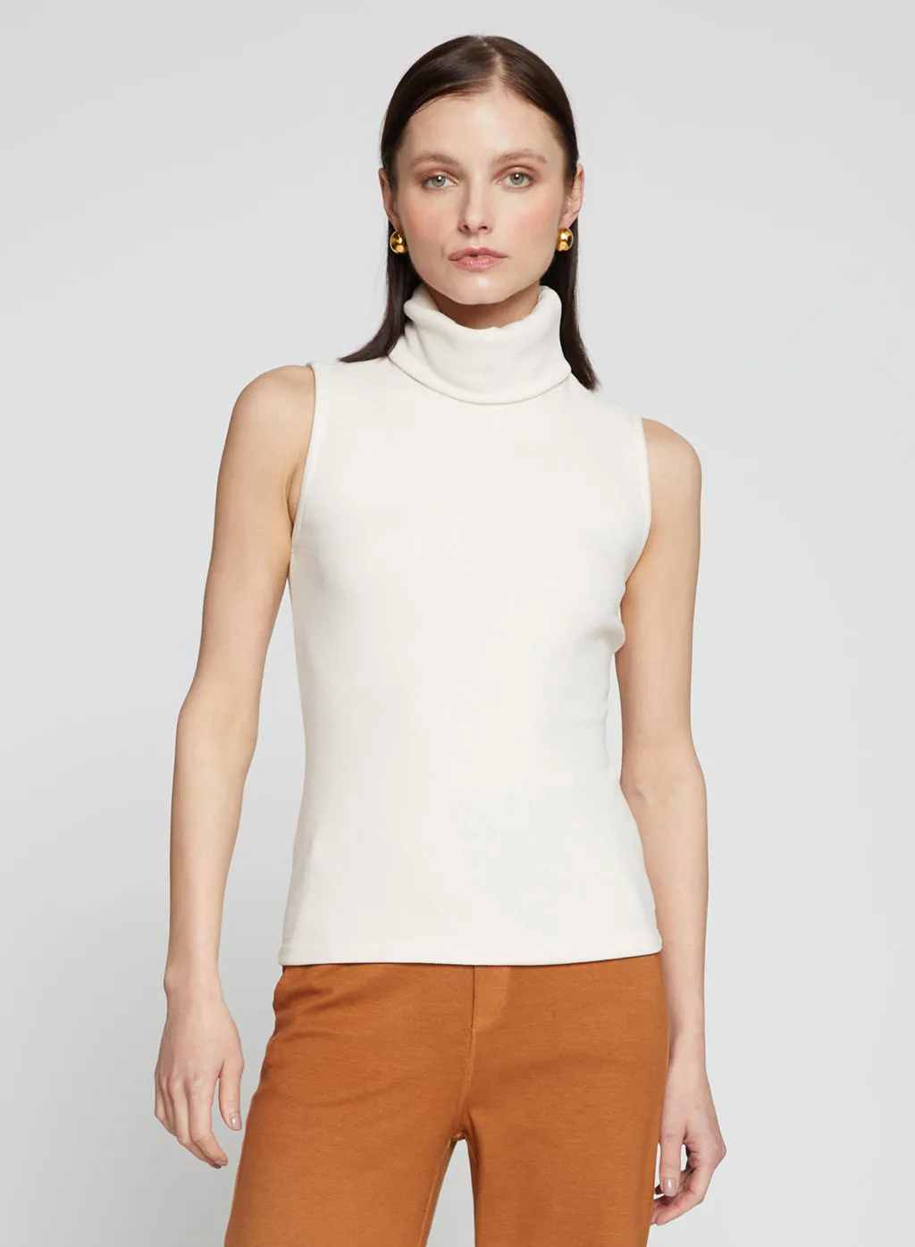 Honeyluxe Flat Back Rib Sleeveless Turtleneck in Cream sold by Stateside
