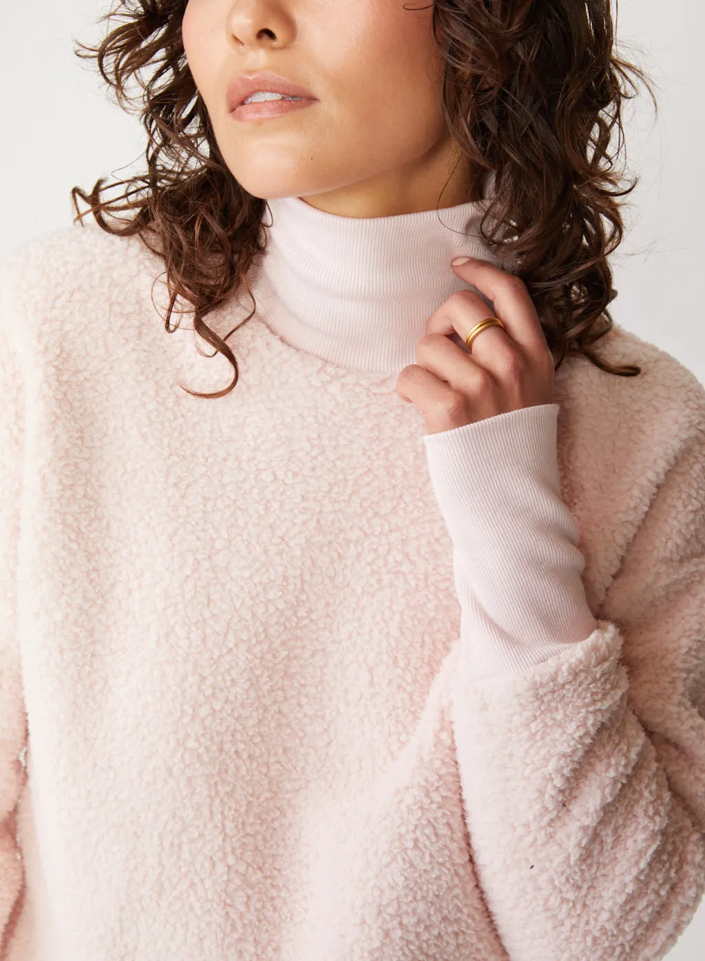 Double Faced Sherpa Long Sleeve Mock Neck Top in Chalk Pink sold by Stateside