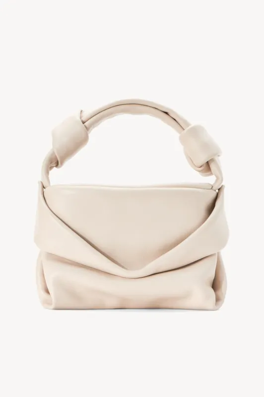 KISS BAG | CREAM sold by STAUD