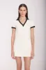 VOLLEY DRESS | IVORY BLACK sold by STAUD