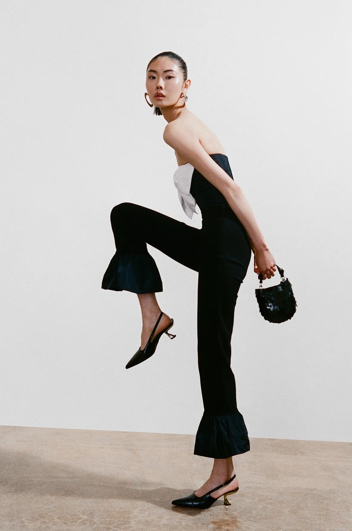 SHOP THE HANDBAG sold by STAUD