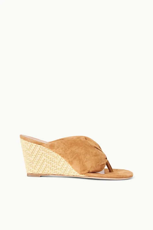DAHLIA WEDGE | CASHEW SUEDE NATURAL RAFFIA sold by STAUD