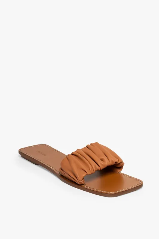 NINA RUCHED SANDAL | TAN sold by STAUD