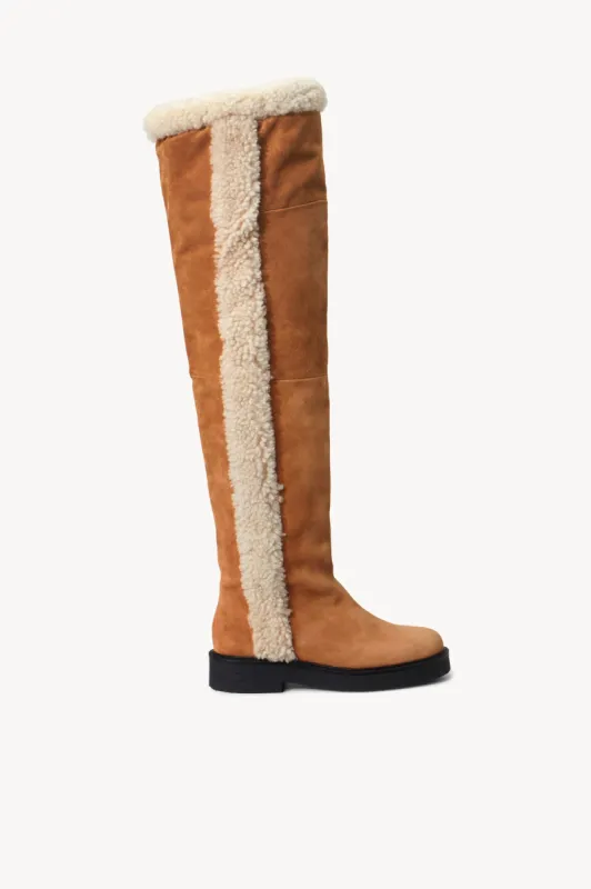 ROWAN OVERKNEE SHEARLING BOOT | TAN CREAM sold by STAUD