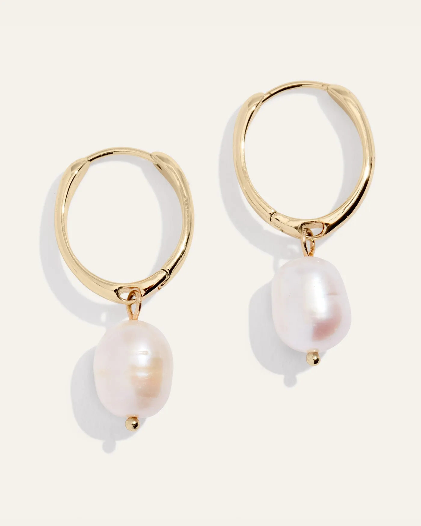 Pearl Essential Huggie Earrings sold by Stella & Dot