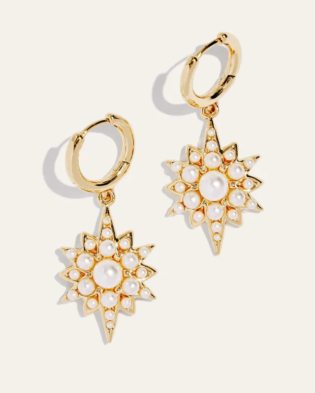 Celestial Pearl Charm Huggie Earrings sold by Stella & Dot