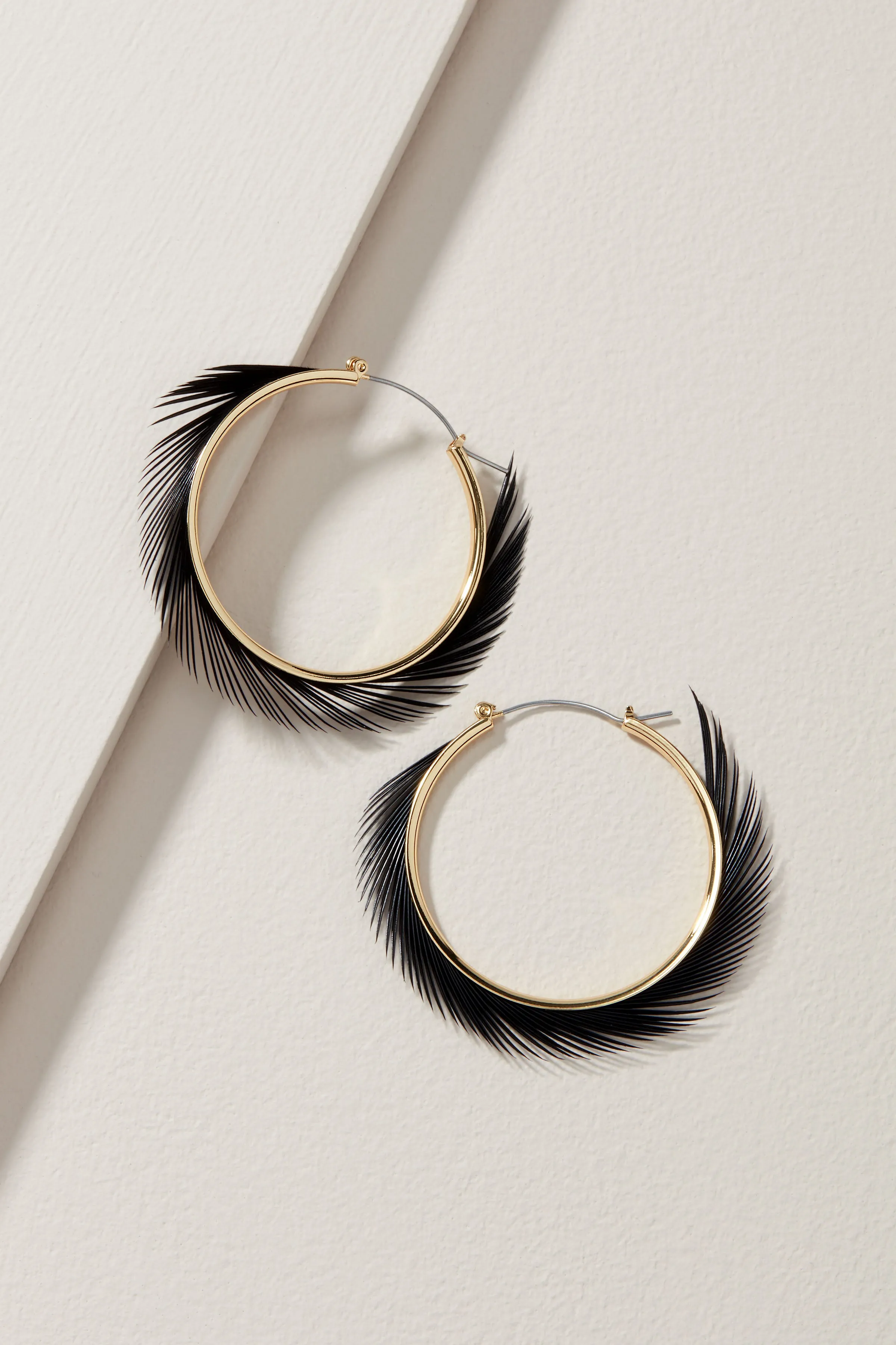 Black Feather Hoop sold by Stella & Dot