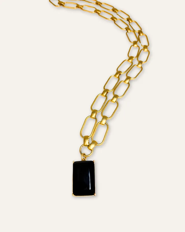 Dark brown quartz and gold chain pendant sold by Stella & Dot