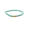 Boho Beaded Stretch Bracelet | Turquoise + Gold sold by Stella & Dot