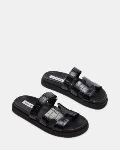 MAYVEN BLACK CROCODILE sold by Steve Madden