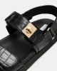 MONA BLACK CROCODILE sold by Steve Madden