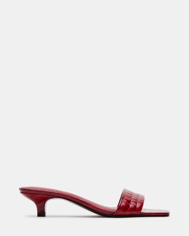 TRINITY RED CROCODILE sold by Steve Madden