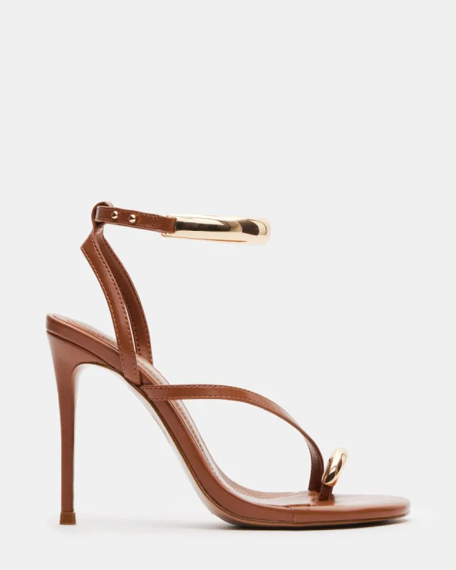 TIA CARAMEL sold by Steve Madden