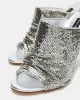ADRIENNE SILVER MULTI sold by Steve Madden