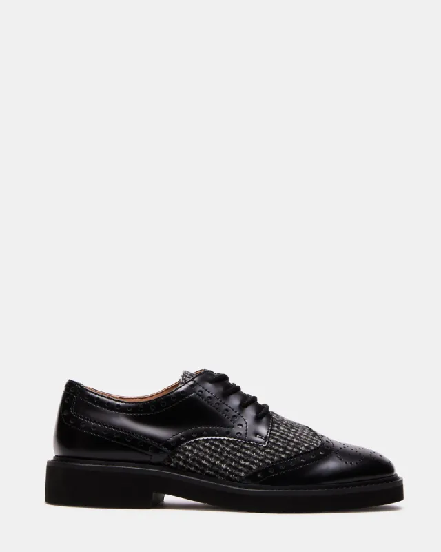 FREDDY BLACK MULTI sold by Steve Madden