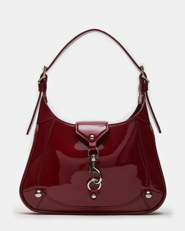 TULLY BAG WINE PATENT sold by Steve Madden
