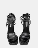 PASSIONATE BLACK PATENT sold by Steve Madden