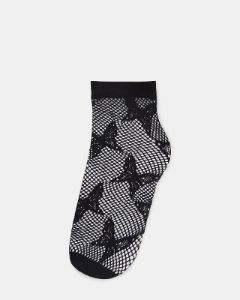 BUTTERFLY FISHNET ANKLET SOCKS BLACK sold by Steve Madden