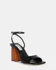 ROZLYN BLACK CROCODILE sold by Steve Madden