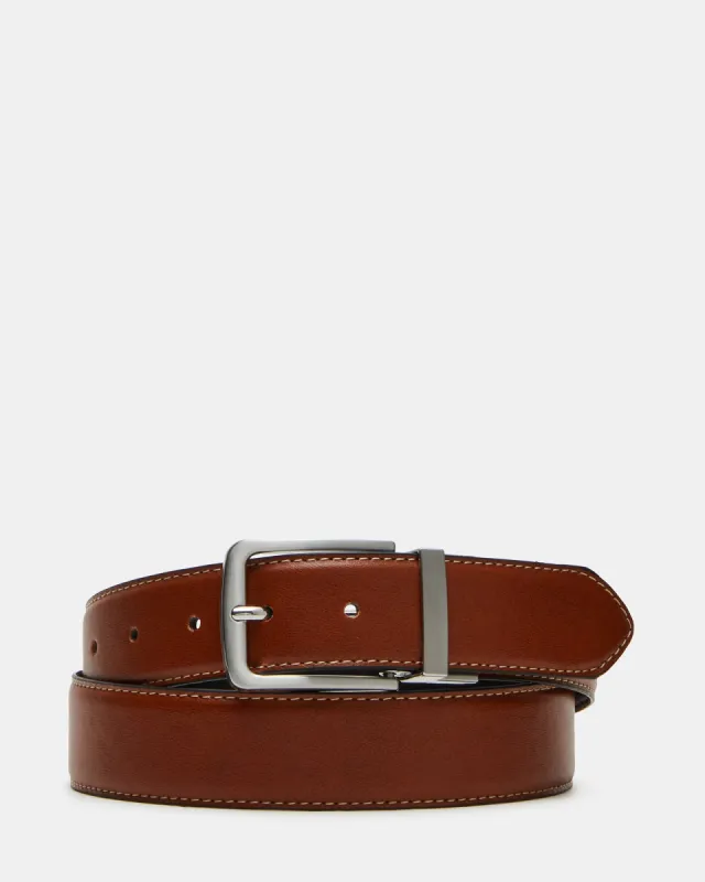 MEN'S REVERSIBLE FEATHERED BELT BLACK/COGNAC sold by Steve Madden