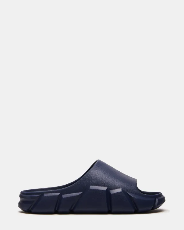 CHARGED NAVY sold by Steve Madden