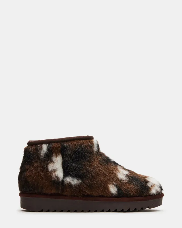 CABIN FAUX FUR MULTI sold by Steve Madden